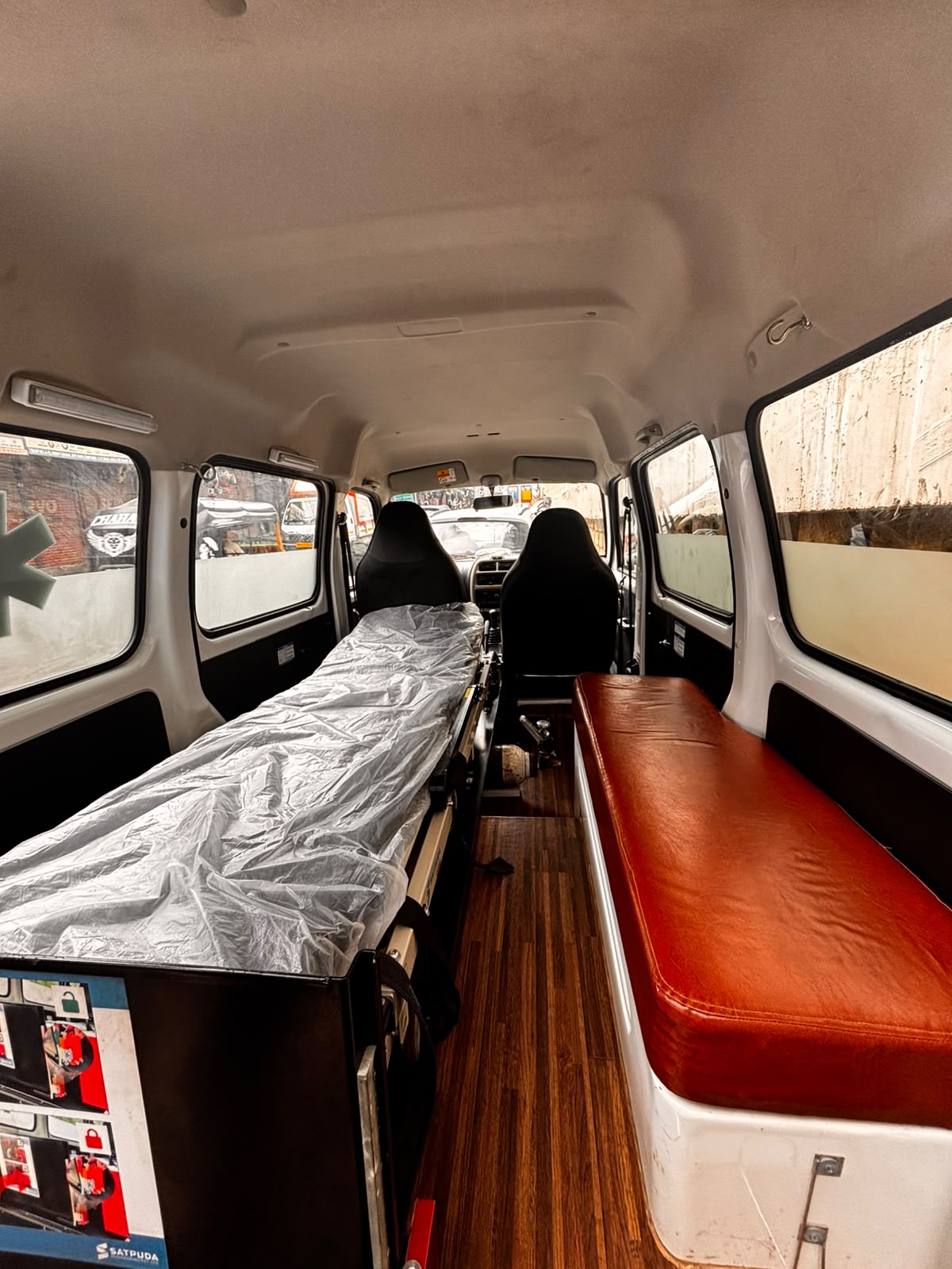 Cardiac care ambulance interior with monitoring equipment